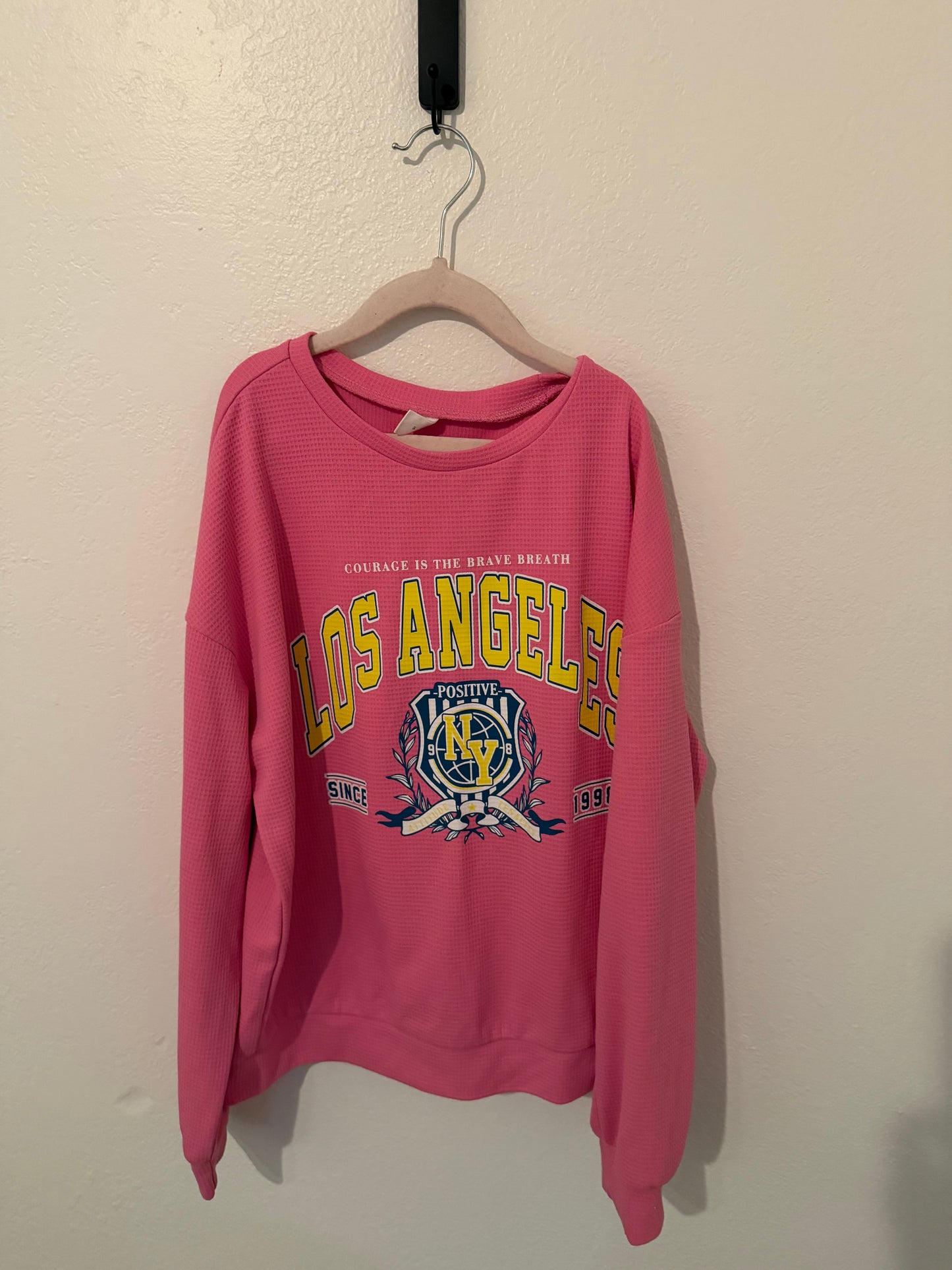 LA pink long sleeve size 11-12 years